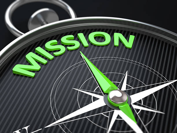 3d render image. Compass needle pointing the green word mission. 3d render image. Compass needle pointing the green word mission.